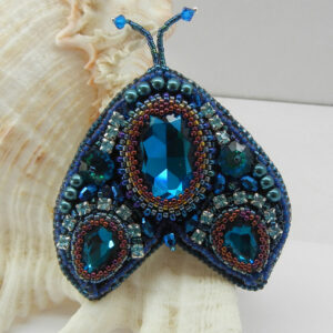Bead embroidered moth brooch